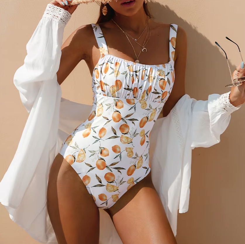 Damen Badeanzug Waida in Weiß mit&nbsp;Orangen